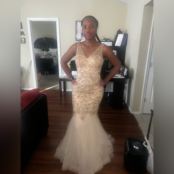 Adored Formal Gown with pearly details and low backdrop